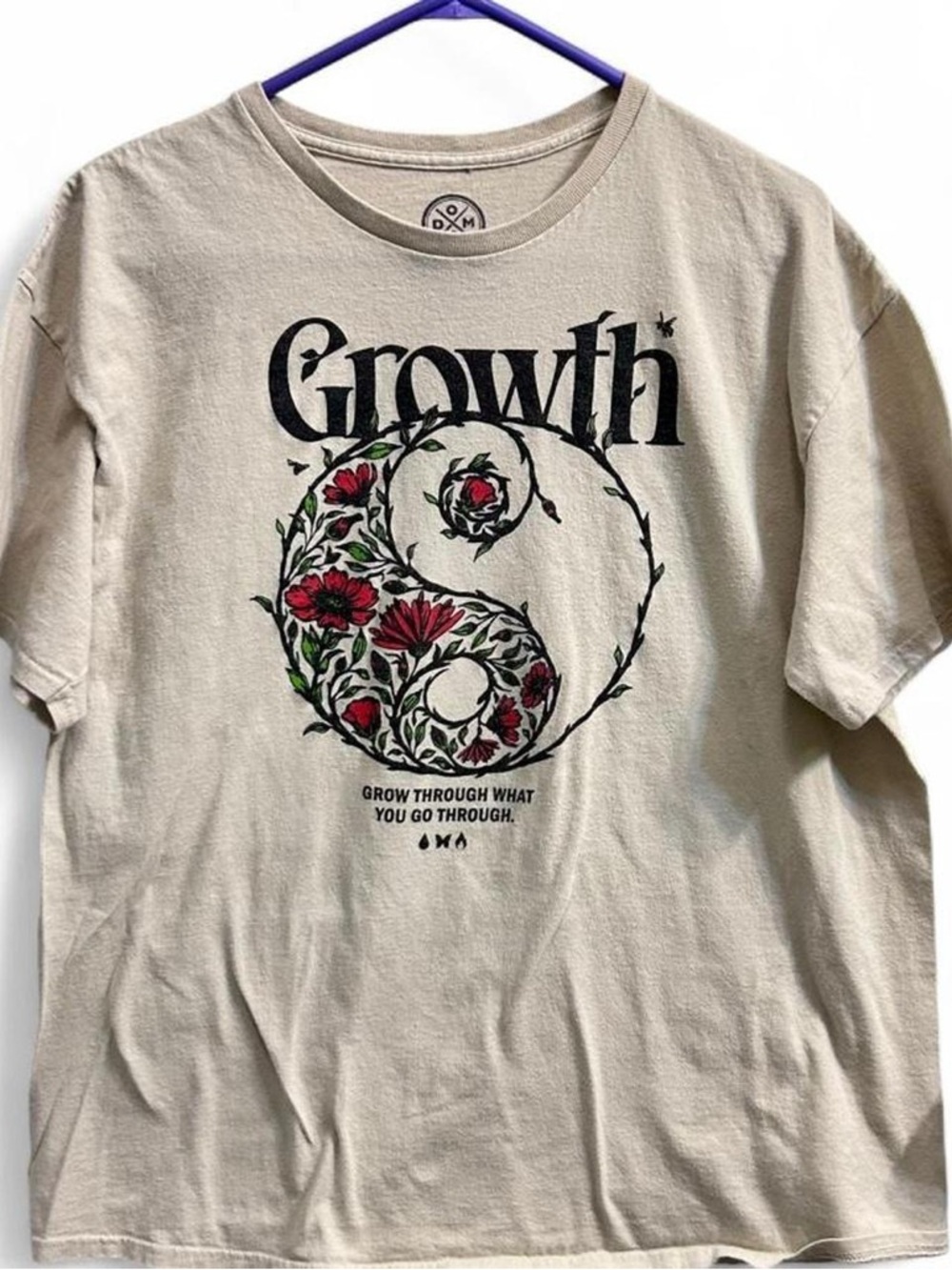Cream colored “Grow through what you go through” tee